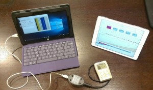 Nucleus CI equipment connected to a Windows laptop, controlled by an iPad showing graphical parameters