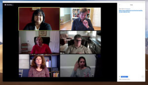 Virtual meeting with six deaf and hard of hearing participants; four women and two men. Two of the participants are signing, while the others are watching. A chat pane shows a web URL under discussion.